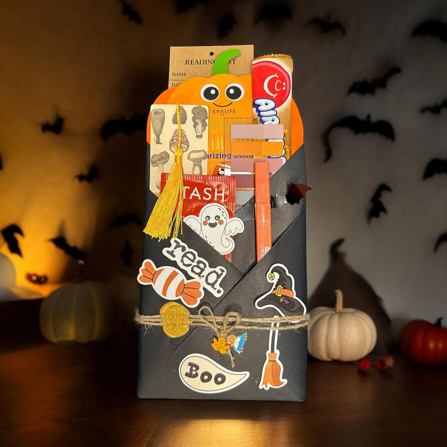 a halloween treat bag with stickers on it