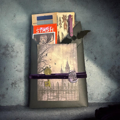 a paper bag with a picture of a castle on it