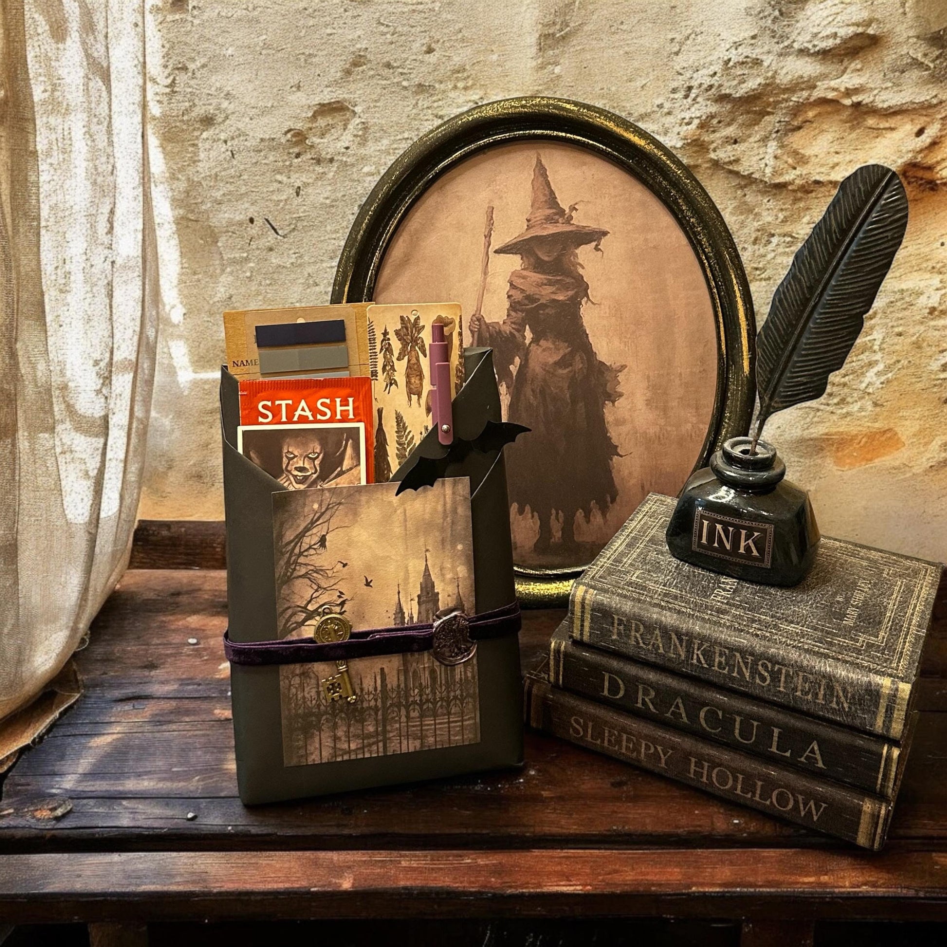 a picture of a wizard with a feather quill and some books