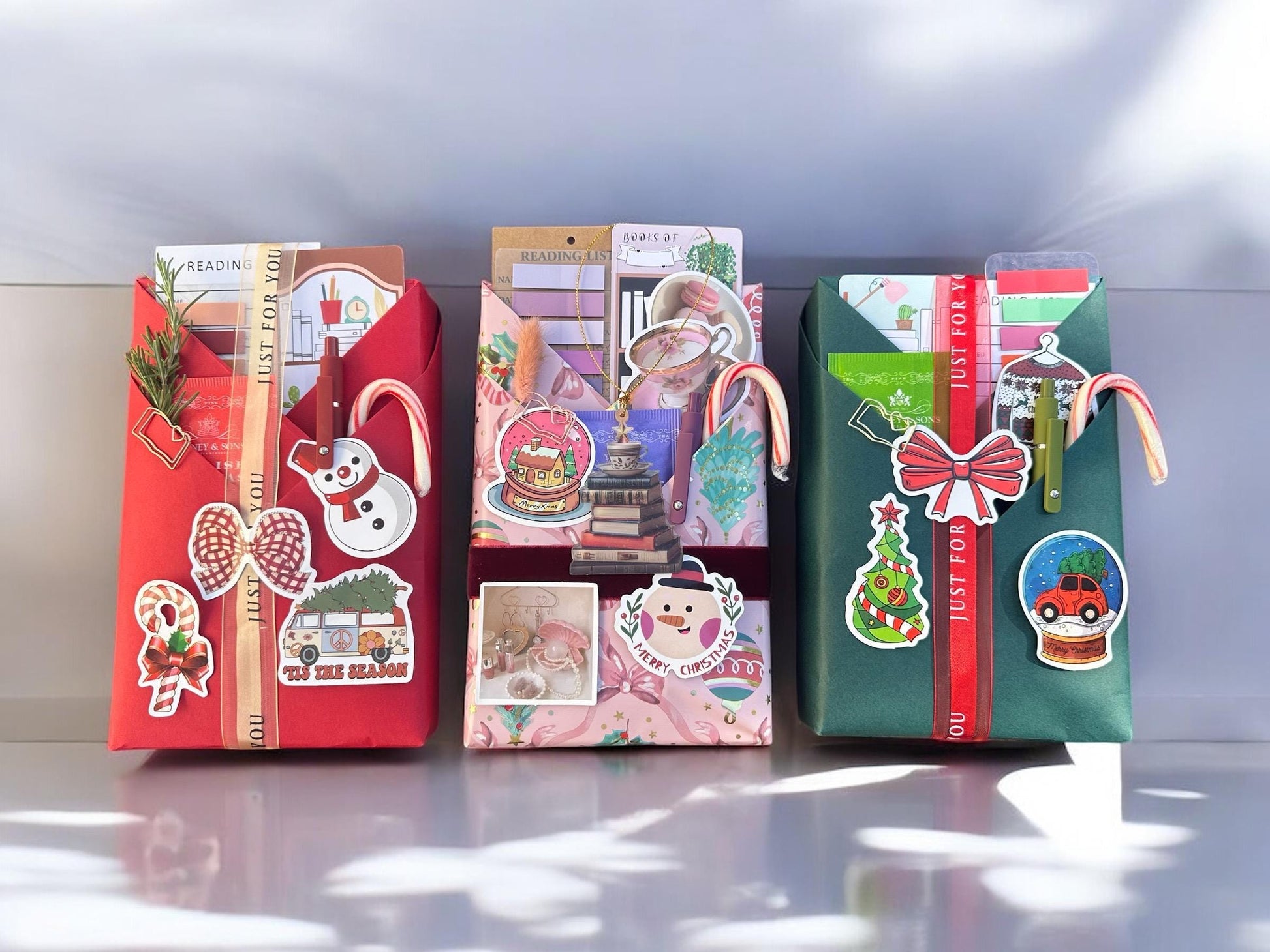 a group of small bags with christmas decorations on them